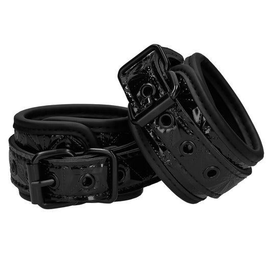 Ouch luxury black handcuffs from Shots Toys, a plush and naughty restraint accessory.
