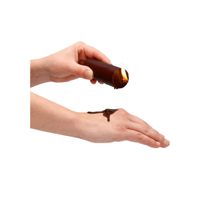 Shots Toys ouch wax play candle, chocolate scented, for bath and massage fun.