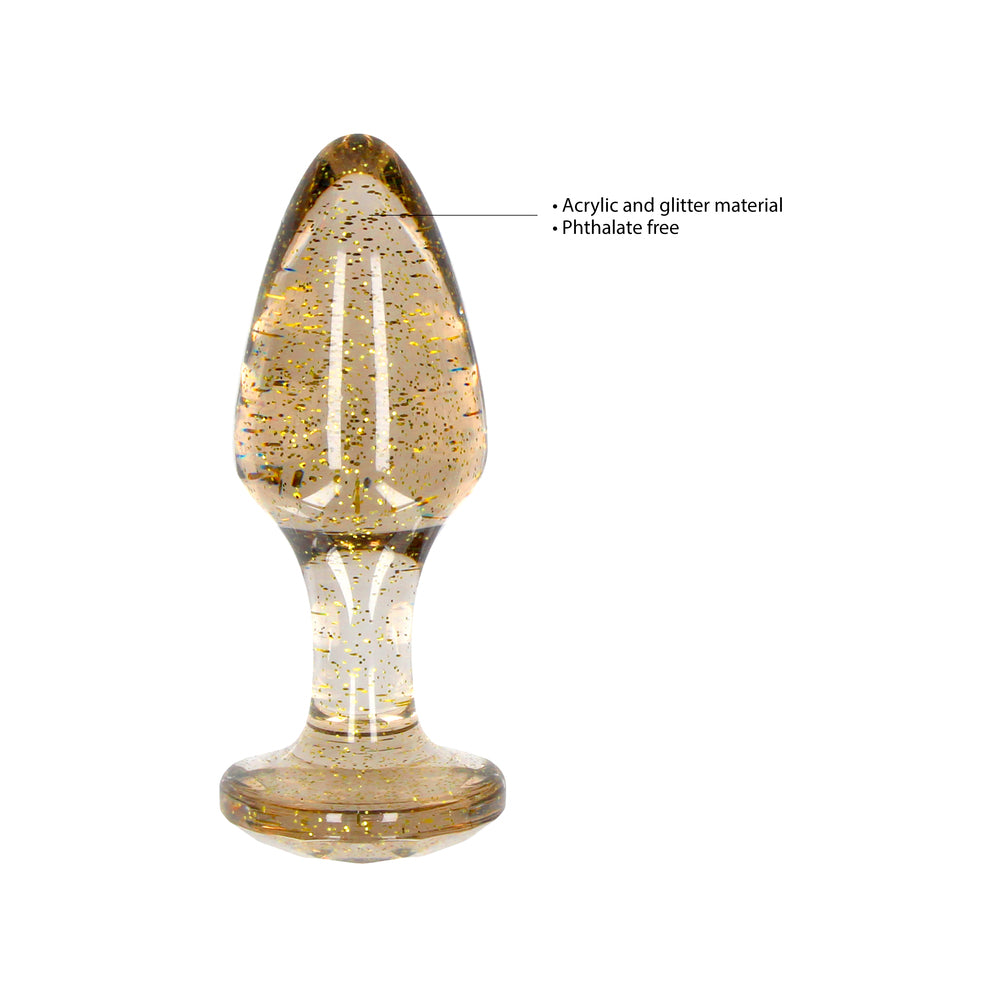 Three golden glitter acrylic butt plugs in varying sizes from Shots Toys.