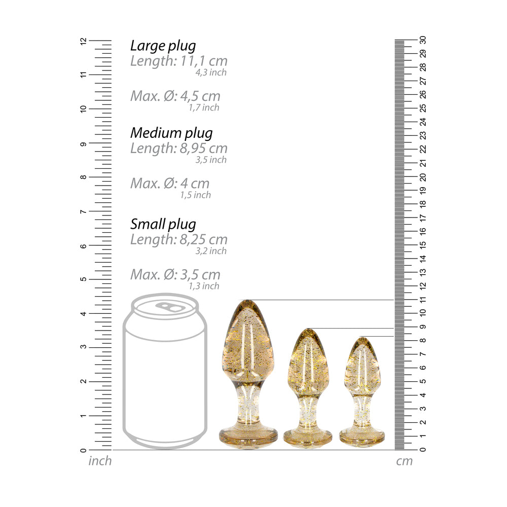A set of three golden glitter acrylic anal plugs, in varying sizes. Ouch by Shots Toys.