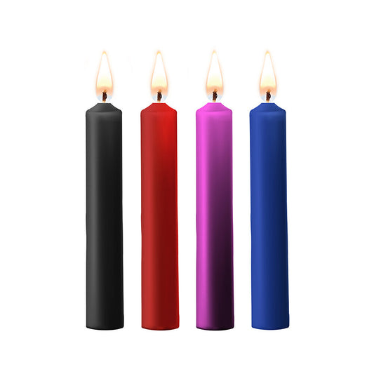 Four small teasing wax candles in assorted colours, perfect for bath and massage.
