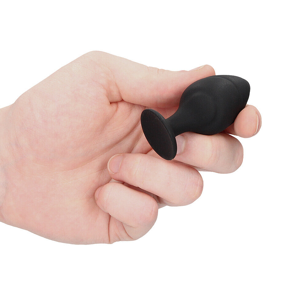 Set of four swirled black silicone anal plugs from Shots Toys for intimate play