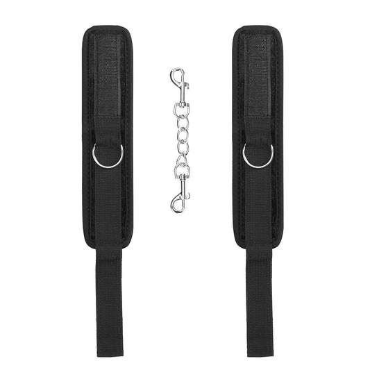 Shots Toys ouch velvet and velcro wrist cuffs, black restraints for playful fun.