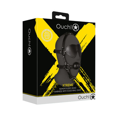 Ouch Xtreme blindfolded harness with solid black ball gag, for intense sensory deprivation play.