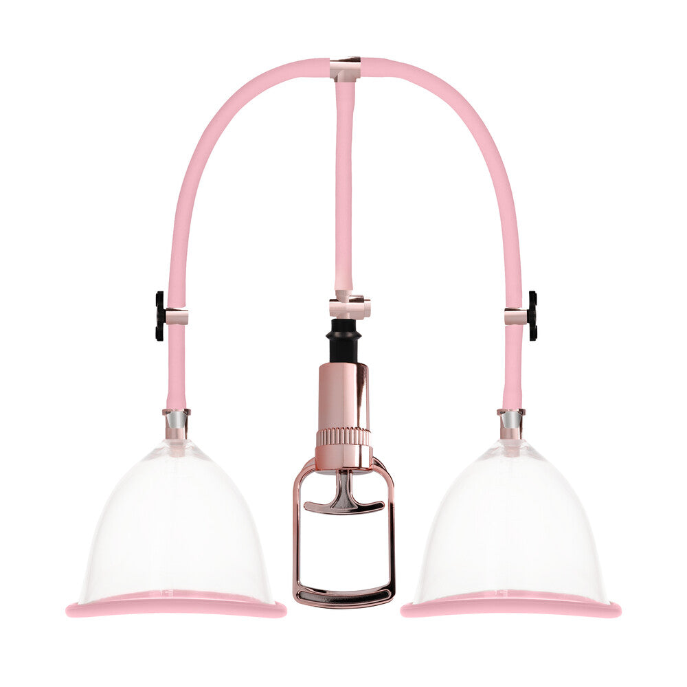 Close-up of a medium-sized rose gold female breast pump by Shots Toys.
