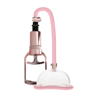 Rose gold female pleasure pump from Shots Toys for enhanced sexual experiences, close-up view.