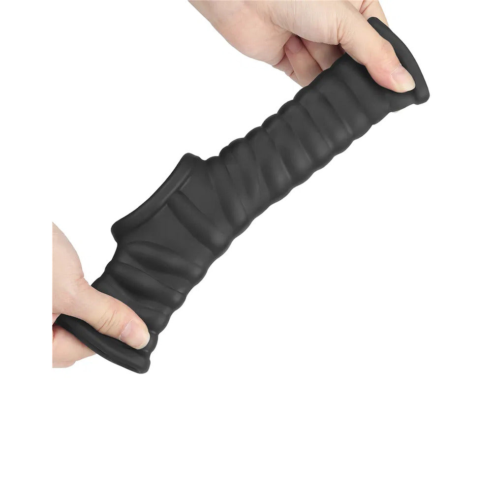 Lovetoy vibrating penis and scrotum sleeve, textured for extra sensation, in a skin-safe material.