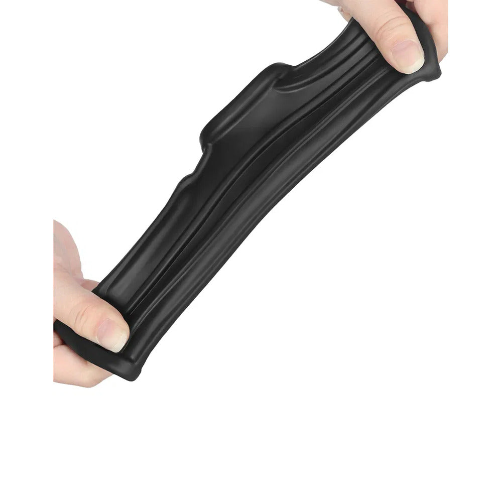 Lovetoy ridge vibrating penis sleeve, tan-coloured, textured for enhanced pleasure during sex.