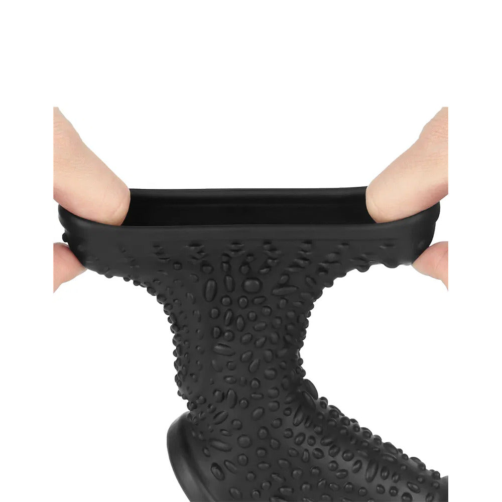 Lovetoy drip penis and scrotum sleeve, clear silicone with textured details for enhanced sensation.