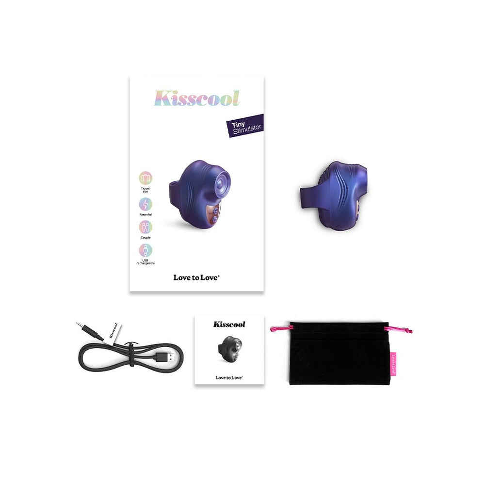 Close-up of a purple, silicone finger vibe designed for clitoral stimulation with textured detailing.