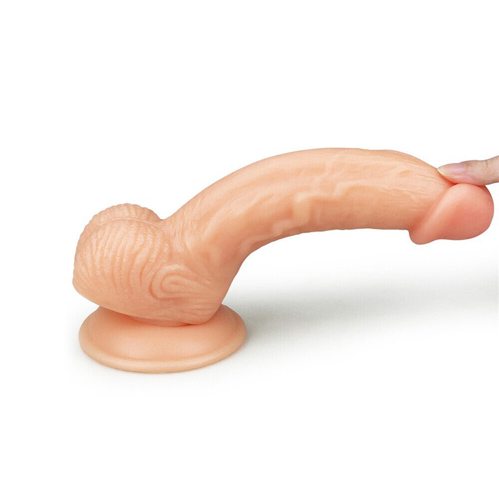 Realistic, eight-inch soft dude dildo in a lifelike skin tone, perfect for solo pleasure.
