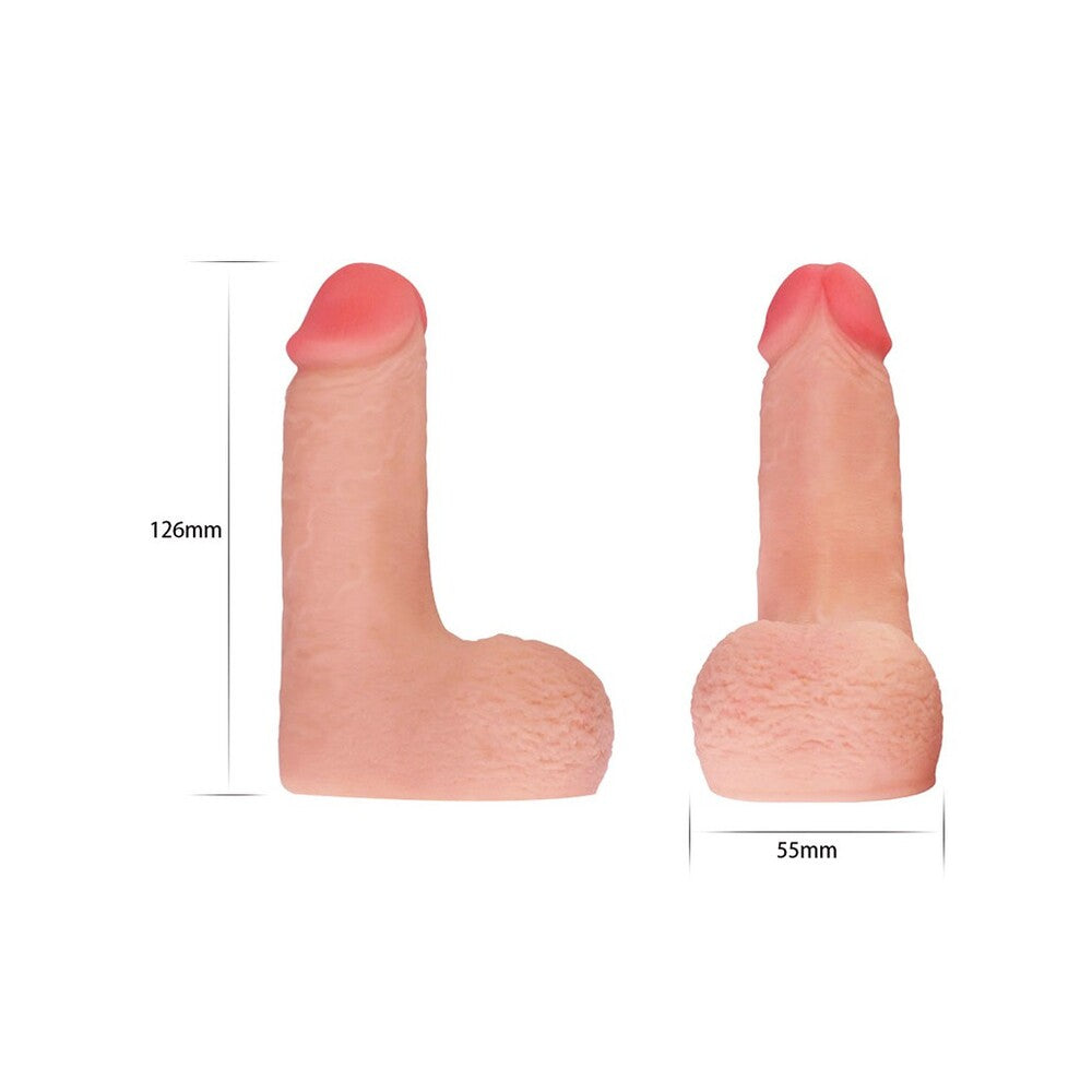 Flesh pink, five-inch realistic penis dildo with a soft, skin-like texture for solo pleasure.
