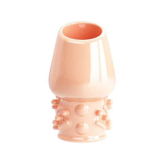 pretty love flesh pink penis sleeve with textured surface, designed for enhanced pleasure.