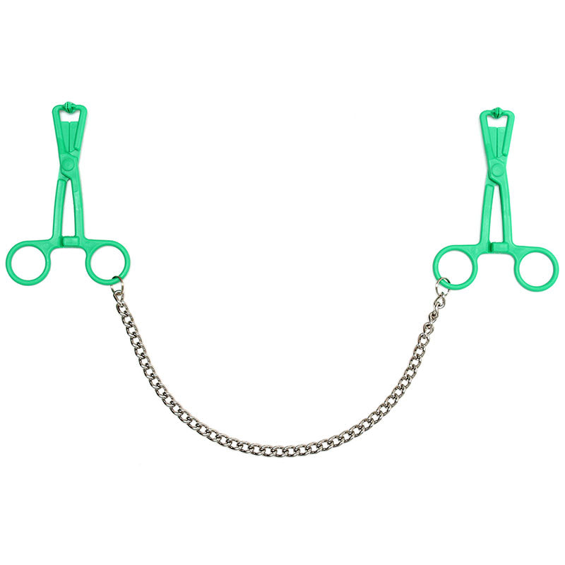 Rimba green scissor nipple clamps, crafted from metal with a connecting chain. Ouch!