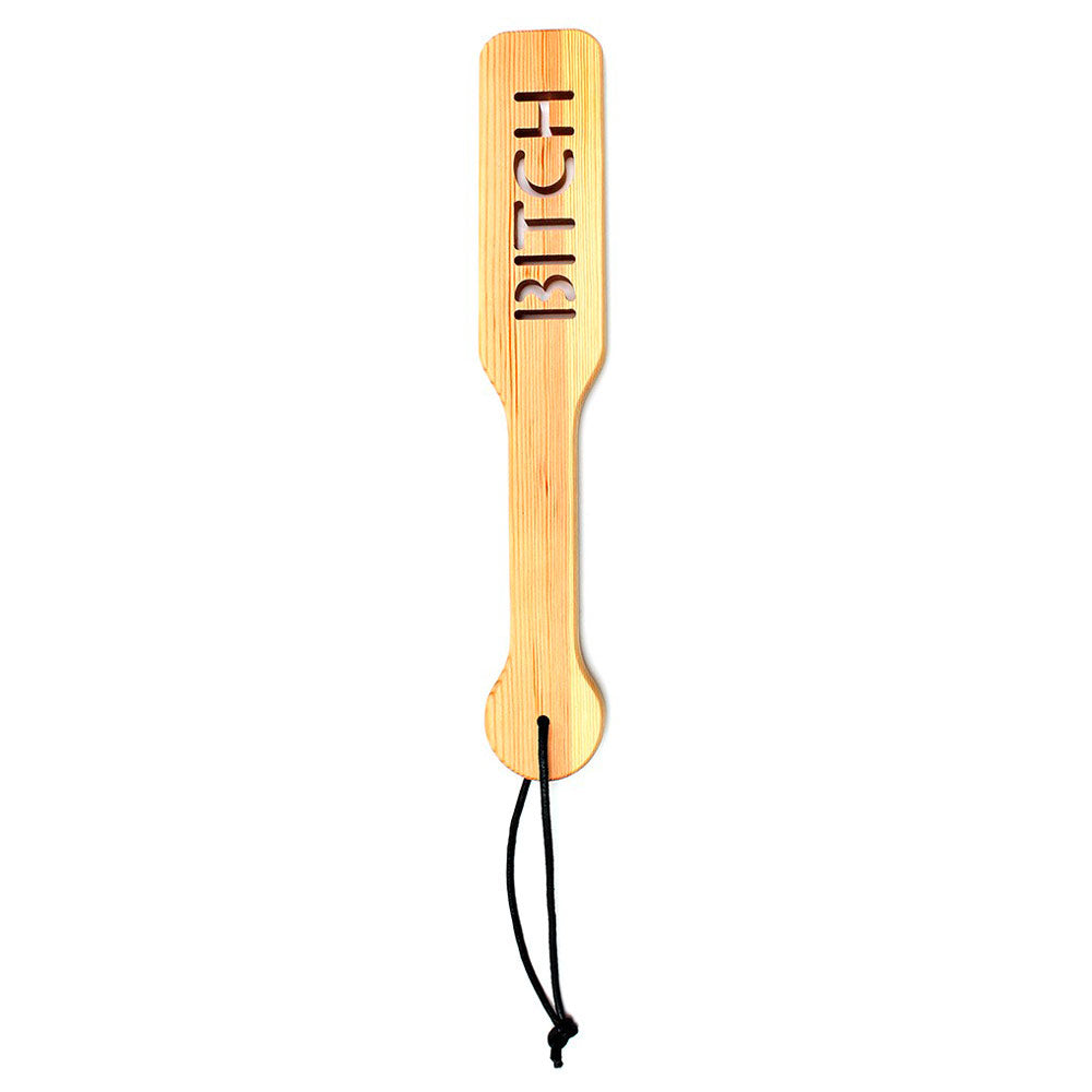 rimba wooden paddle, a classic design with a smooth finish, perfect for playful discipline.