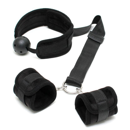 Rimba breathable mouth gag with wrist cuffs from a bondage kit, showing restraint.