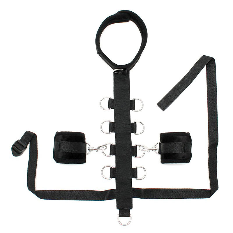 Close-up of the black padded collar, restraint line, and cuffs set from Rimba.