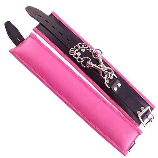 Rouge Garments pink ankle cuffs, padded with black trim, part of a restraint set.