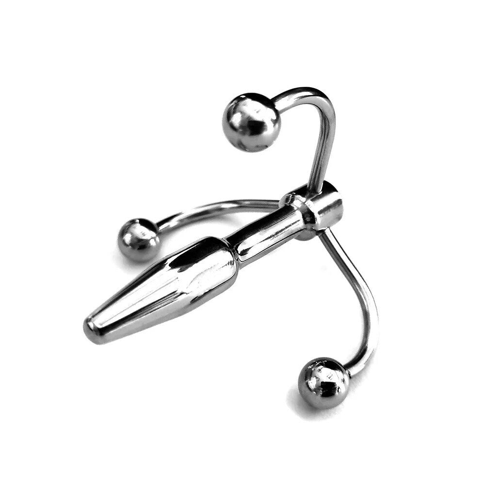 Rouge Garments stainless steel crown-shaped penis plug, polished finish for urethral play.