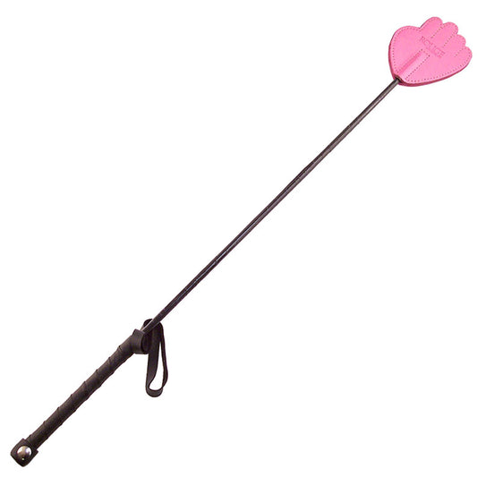 A pink hand riding crop from rouge garments, a stylish and playful whip accessory.