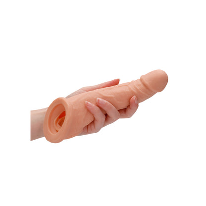 Flesh pink, 8-inch penis sleeve made from soft, flexible material, part of the 'penis sleeves' range.