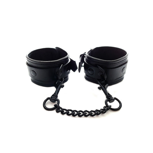 Rouge Garments plain black wrist cuffs, appearing as soft restraints made of smooth material.