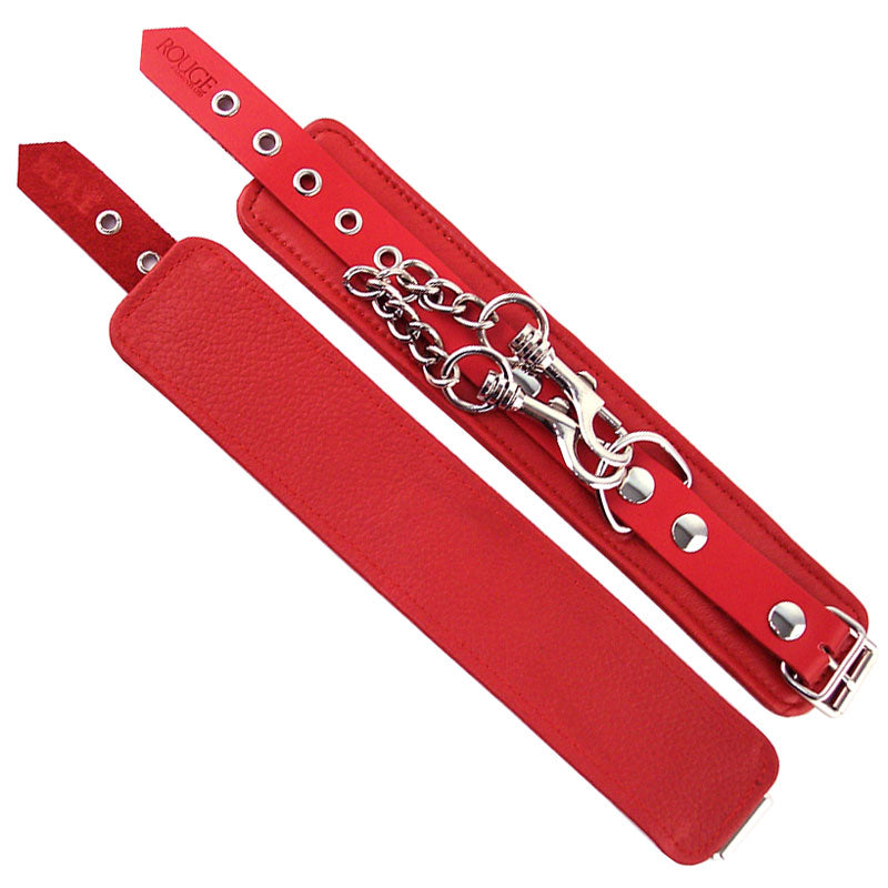 Rouge garments wrist cuffs in a vibrant red, appearing to be made of soft material, restraints.