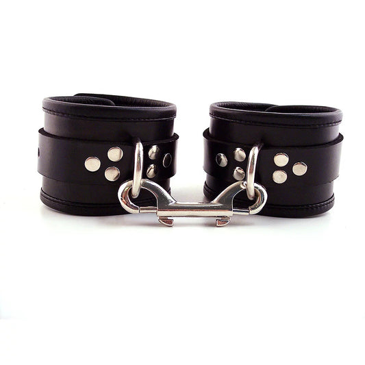 rouge garments black leather ankle cuffs with subtle piping detail, a stylish restraint.