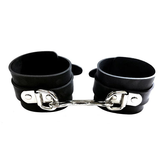 Rouge Garments black rubber ankle cuffs, a stylish and discreet restraint accessory.