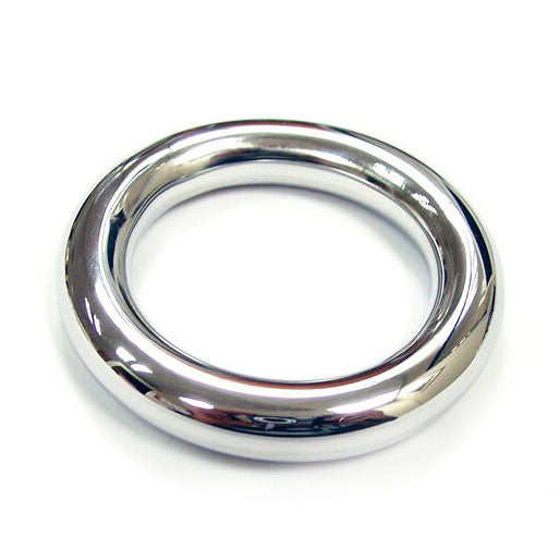 Close-up of a polished, stainless steel, 40mm cock ring from rouge garments, shiny finish.