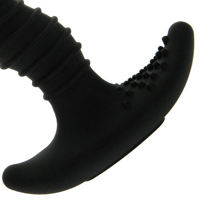 Nexus Ridge Rider prostate massager in black, showing the textured surface and curved design.