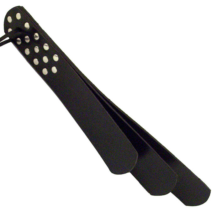 Rouge Garments three flap black paddle, showing the handle and textured surface.