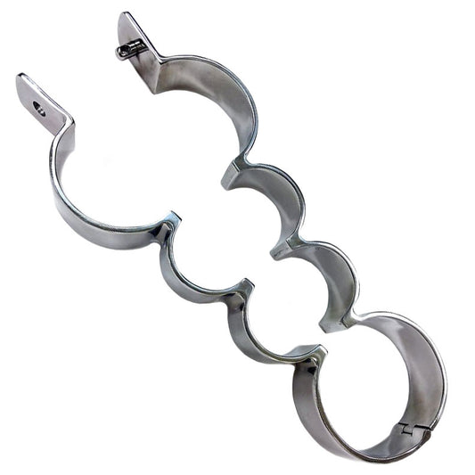 Stainless steel heavy metal wrist and ankle binder, part of Rouge Garments' restraints collection.