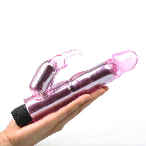 Crystal pink rabbit vibrator with textured shaft and bunny ears, designed for sensual pleasure.