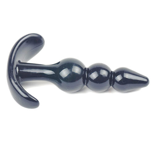 Small black butt plug with beaded texture, designed for anal play and pleasure.