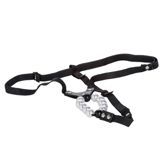A red, stretchy thong with a vibrating clitoral stimulator featuring pleasure pearls.