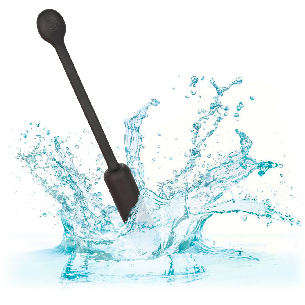 Petite bullet vibrator with rechargeable wristband remote control in a smooth finish.