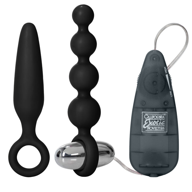 Vibrating buttplug kit, a cheeky pleasure set from california exotic, with multiple attachments.