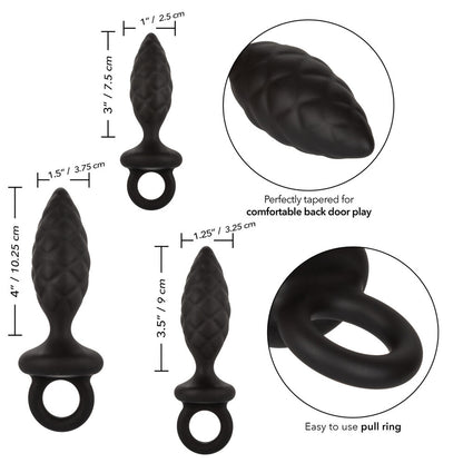 Three smooth, graduated silicone anal probes in varying sizes, part of a kit.