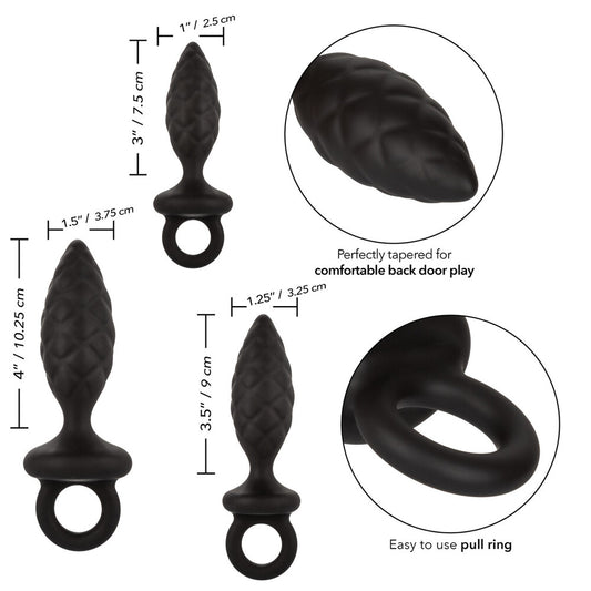 Three smooth, graduated silicone anal probes in varying sizes, part of a kit.