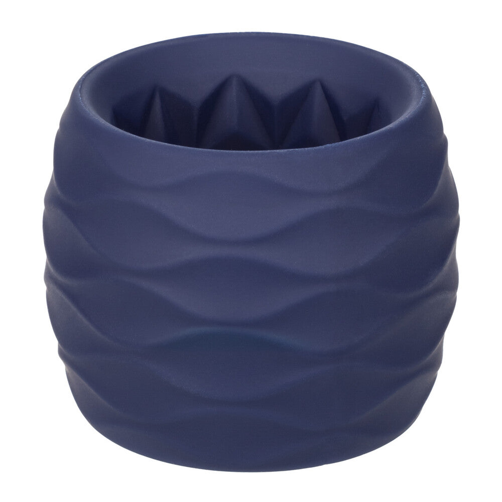 Close-up of a black, flexible silicone cock ring designed for endurance and pleasure.