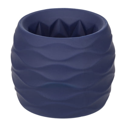 Close-up of a black, flexible silicone cock ring designed for endurance and pleasure.