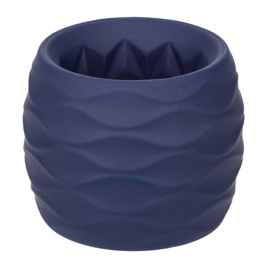 Close-up of a black, flexible silicone cock ring designed for endurance and pleasure.