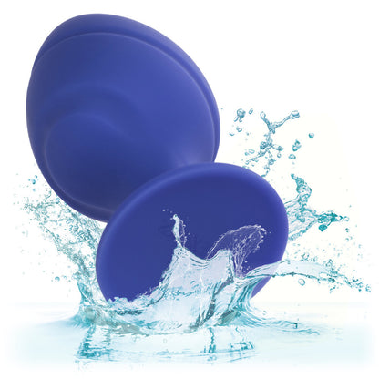 A pair of purple, tapered butt plugs with smooth finish, ideal for anal play.