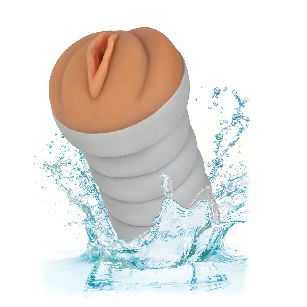 California Exotic ribbed brown masturbator with a textured grip, for intimate pleasure.