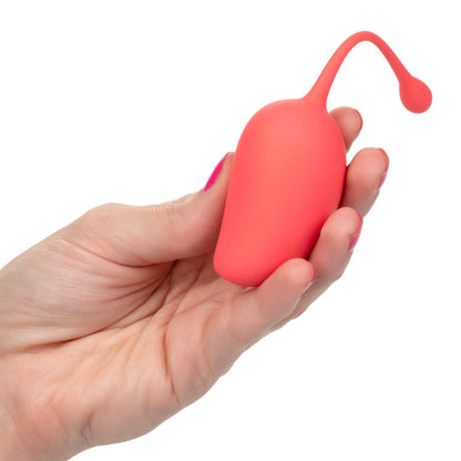 Mango-coloured kegel exercise set for pelvic floor training, made by California Exotic.