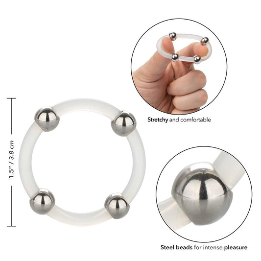 Close-up of a large, flexible silicone love ring with embedded steel beads, showing its texture.