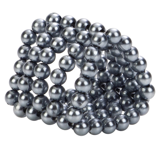 Close-up of clear, beaded love ring designed to enhance pleasure, from california exotic.