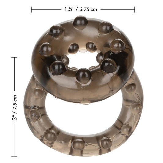 Close-up of a silver-tone love ring vibrator with textured detailing from California Exotic.