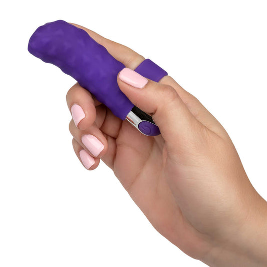 Purple finger vibrator from California Exotic, rechargeable and designed for intimate teasing and pleasure.